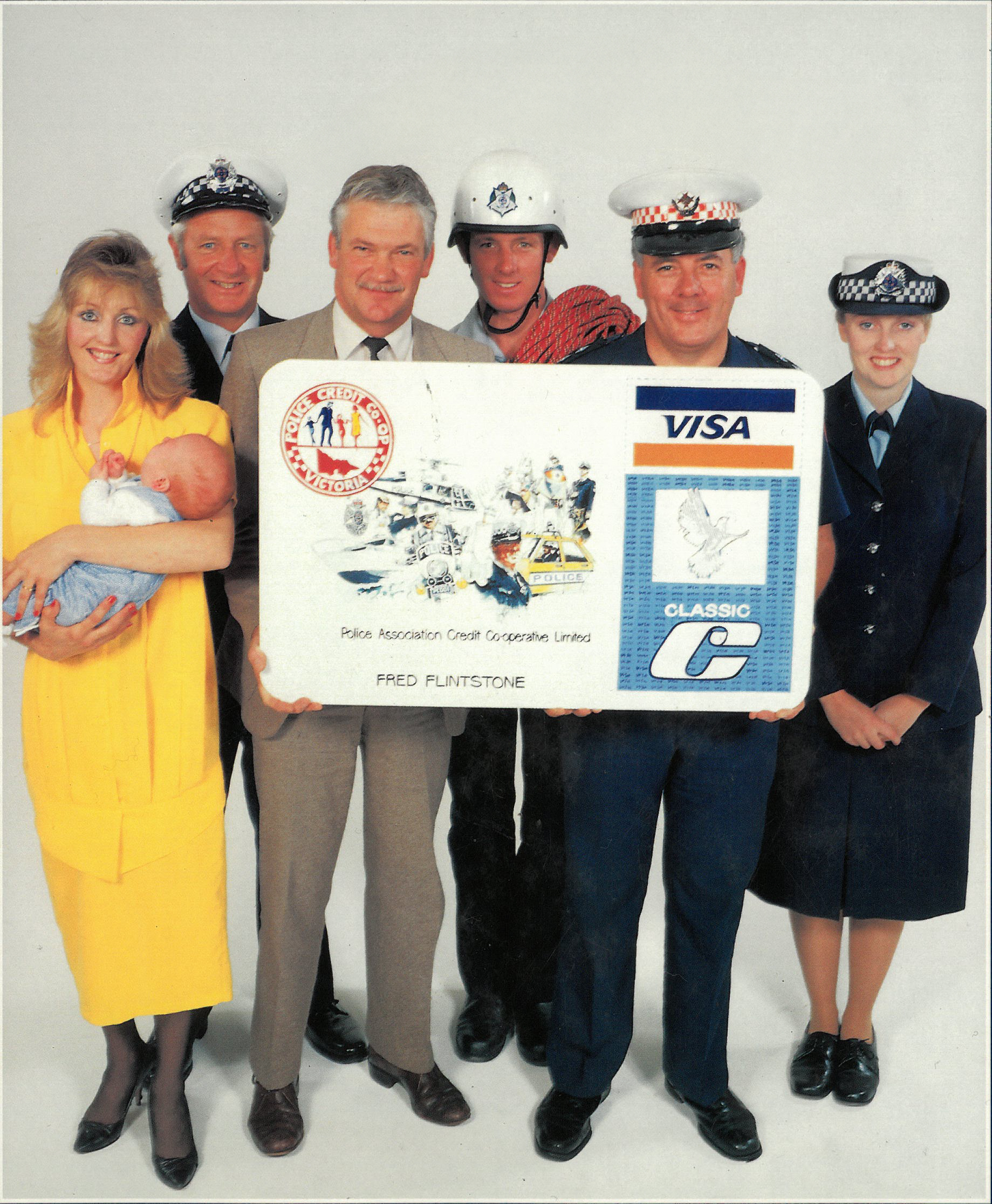 A photograph of a family of members from the Police Credit Co-op (now BankVic) from 1987.