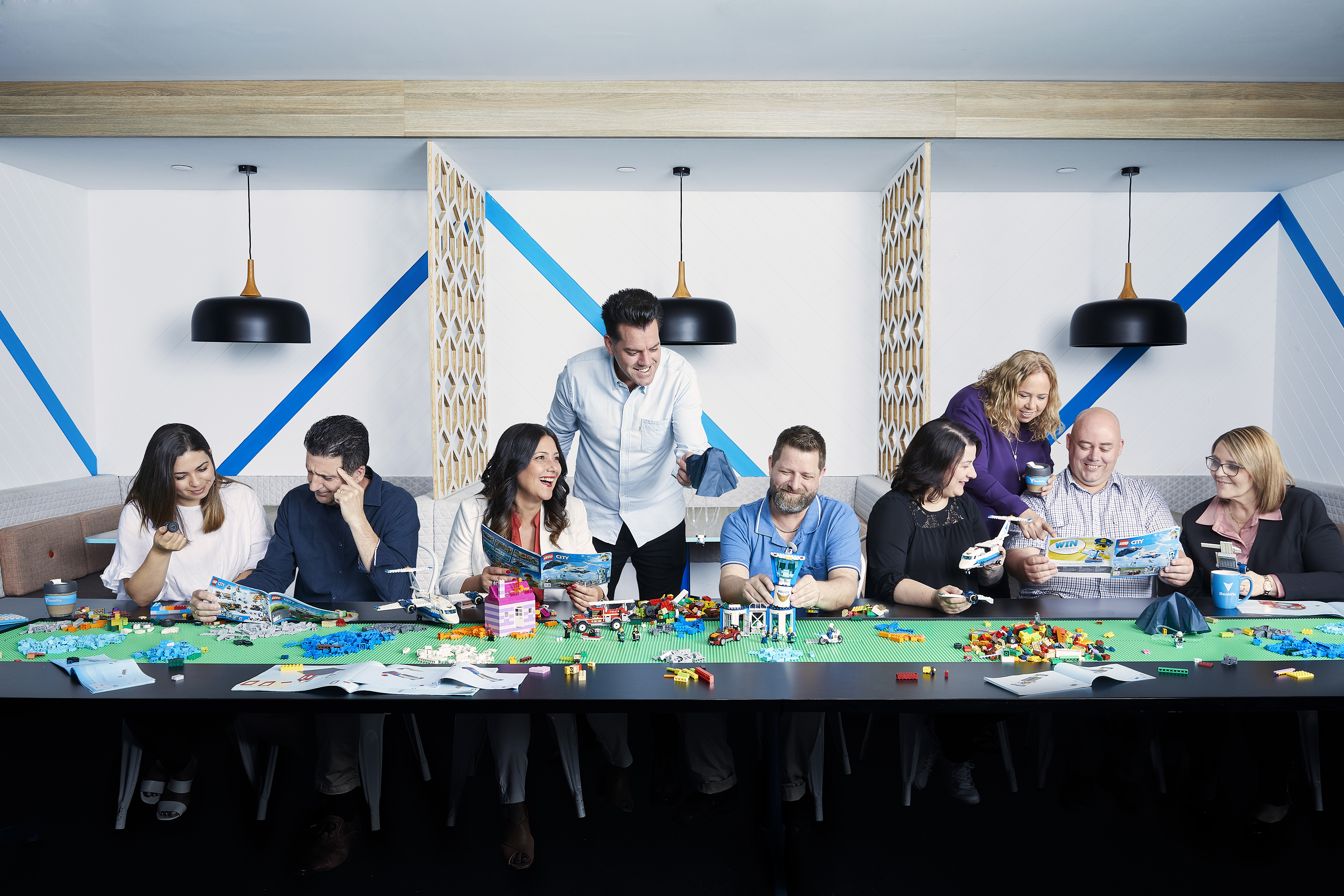 A photo of BankVic staff playing with lego in 2015.